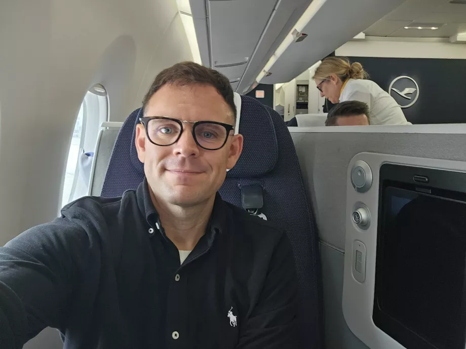 Eu em classe executiva Allegris